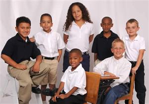 Elementary school-age children in uniforms 